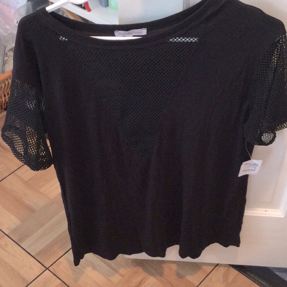 NWT Charlotte Russe black top with fishnet sleeves and front panel. Small.